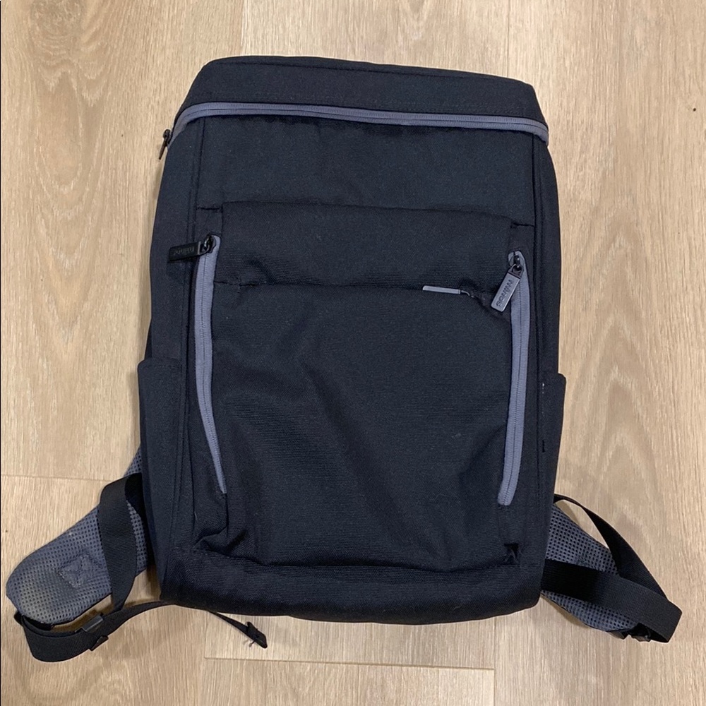 Like New Minos Tech Backpack with padded laptop pocket and book belt